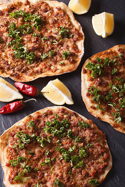 istock Traditional Turkish lahmacun closeup on a table. vertical 598958154