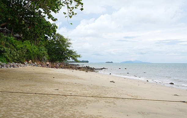 istock Rock beach with cloudy sky in Jum island, Krabi 598958610