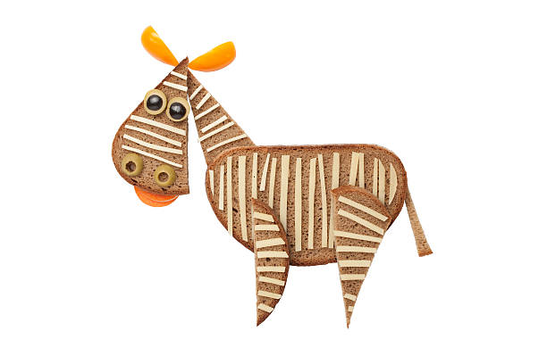 istock Funny zebra made of bread and vegetables 598958910