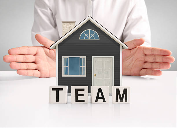 istock concept by house from in hand 598959002