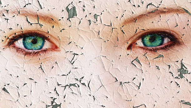 istock Young woman with cracked face 598959374