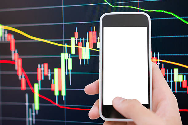 istock Asian Businessman using a smart phone analysis stock 598959392