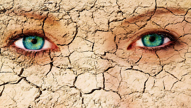 istock Young woman with cracked face 598959582