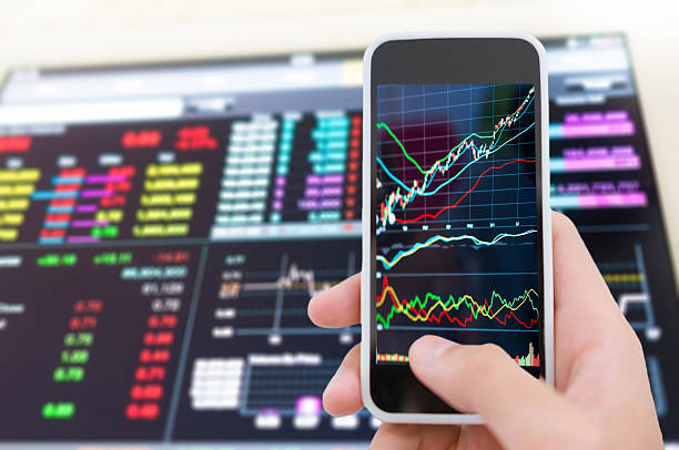 istock Asian Businessman using a smart phone analysis stock 598959946