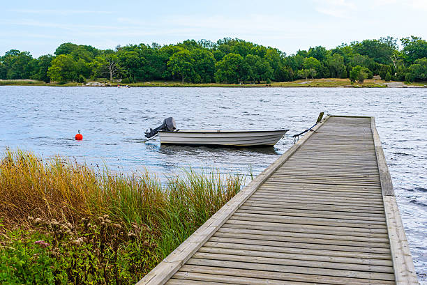 small moored motorboat - moored boats imagens e fotografias de stock