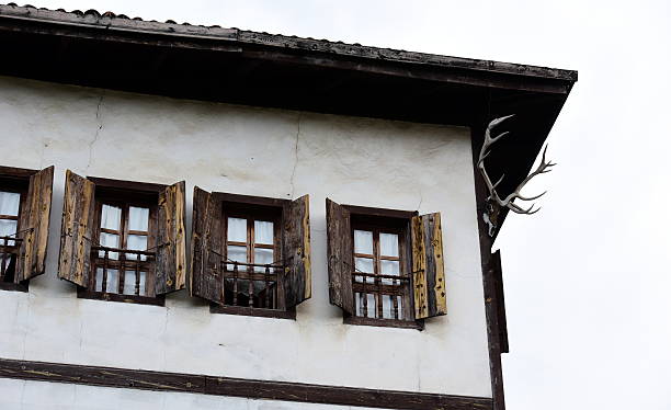 istock deer horn on the corner of old house 598962302
