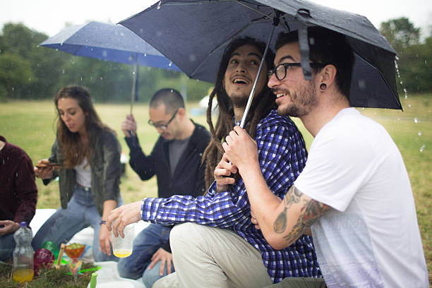 istock Picnic in park under umbrellas 599100552