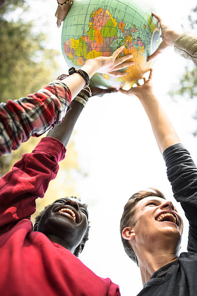 istock teenagers college student smiling with globe 599101260