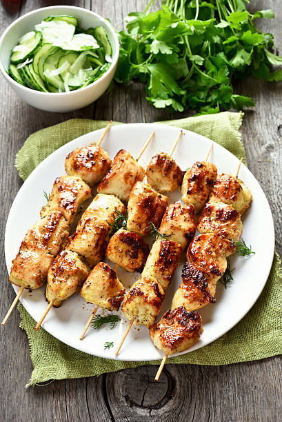 istock Chicken kebab and vegetable salad 599101478