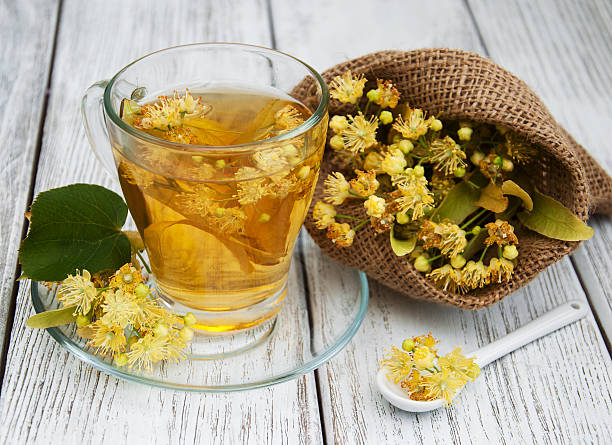 istock cup of herbal tea with linden flowers 599104394