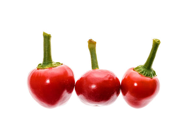 istock Red hot big cherry peppers chili isolated on white background. 599112450