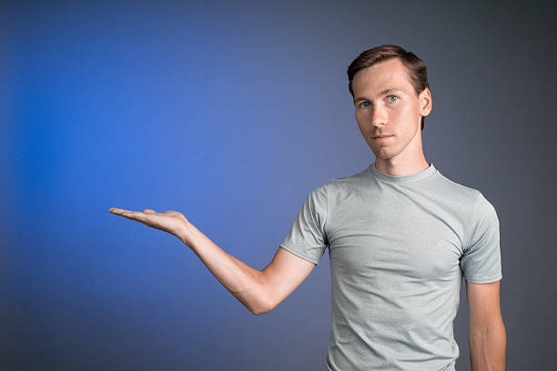 istock Man holding something on his palm. 599115722
