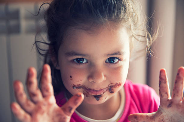 istock Girl with dirty mouth 599118234