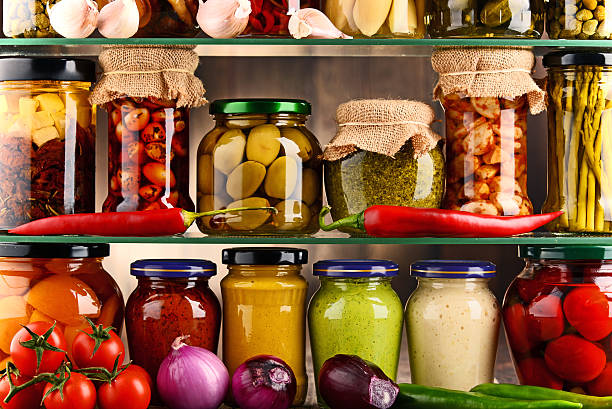 istock Jars with variety of pickled vegetables. 599120808