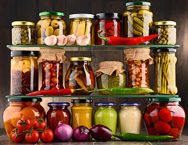 istock Jars with variety of pickled vegetables. 599120872