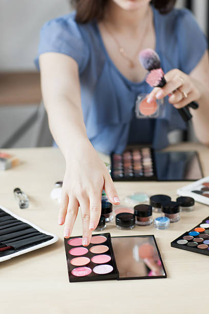 istock Artist taking rouge with brush visagiste workplace 599121480