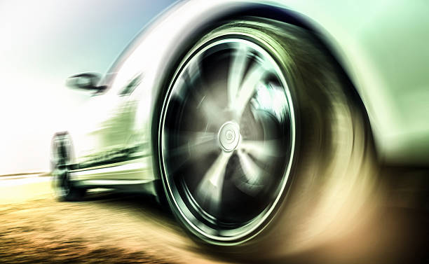 istock Motion blurred sports car tire 599121870