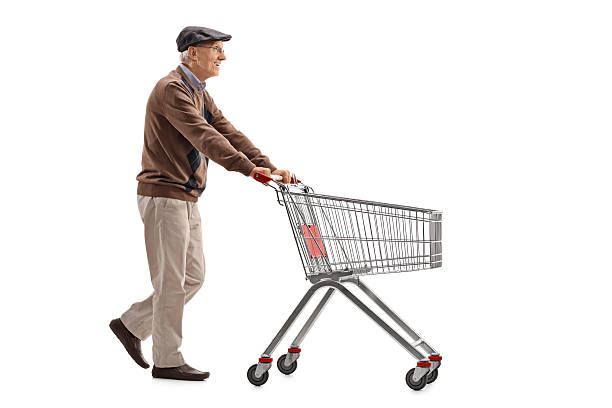istock Elderly man pushing a shopping cart 599122916