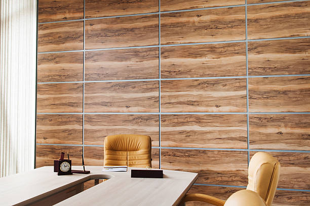 istock Office interior design with wall of synthetic wood panels 599125432