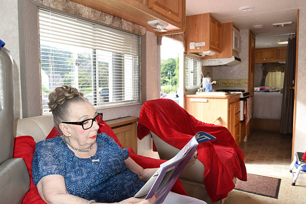 Senior woman sitting in RV