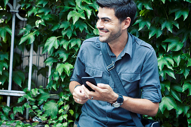 istock Man on the streets using mobil phone 599126548