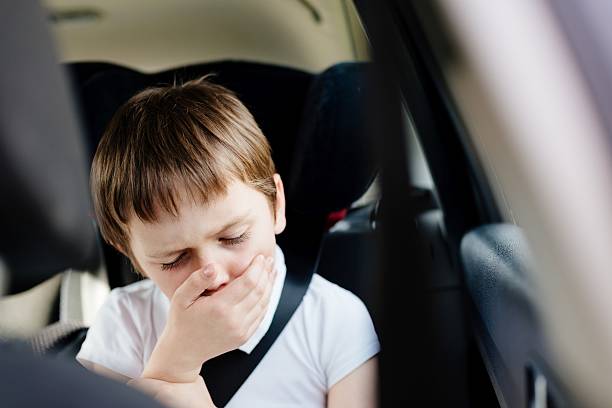 istock Child suffers from motion sickness in car 599127686
