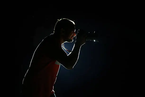 Photo of Young Journalist Doing Photography At Night