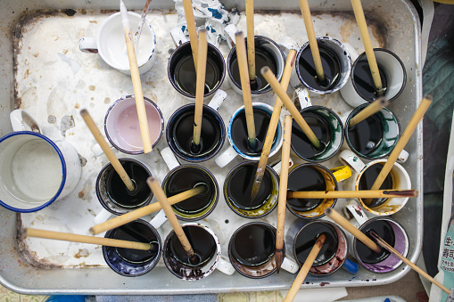 Kyoto, Japan - May 30, 2016: Overhead view of a palette of inks used for painting traditional Japanese Kimonos in a factory in Kyoto, Japan.  