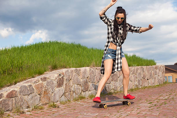 istock The woman does a trick with skate 599130942