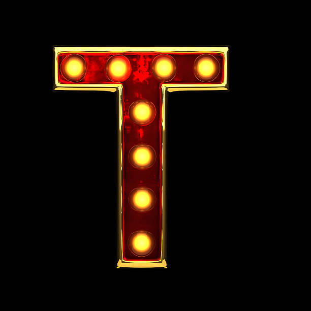 istock t isolated golden letter with lights on black. 3d illustration 599131018