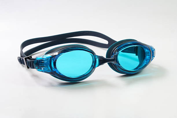 swimming goggles on white background - yüzücü gözlüğü stok fotoğraflar ve resimler