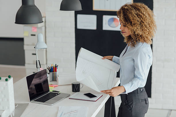 istock Latina Architect Working In Her Office. 599133460