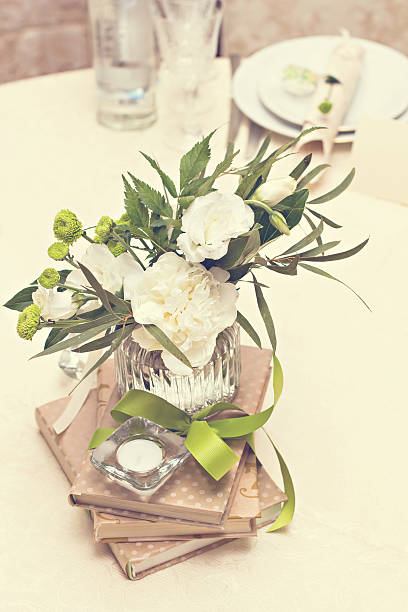 istock bouquet of white flowers. wedding table decor. 599135410