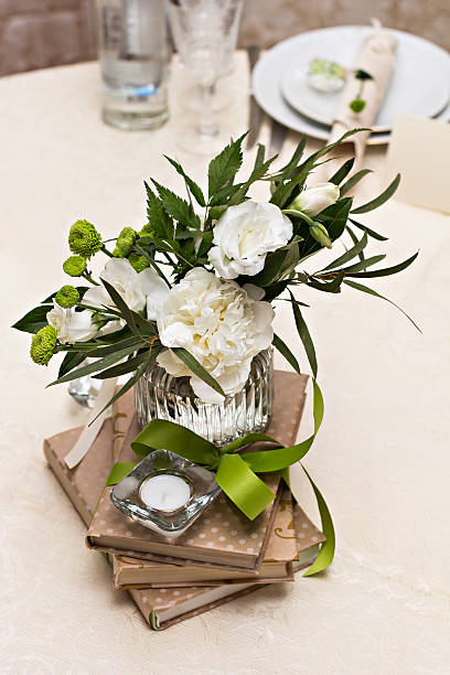 istock bouquet of white flowers. wedding table decor. 599137036