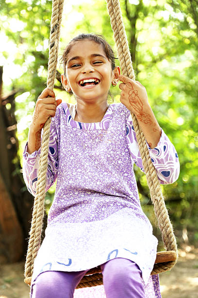 istock Cheerful Girl Swinging 599137110