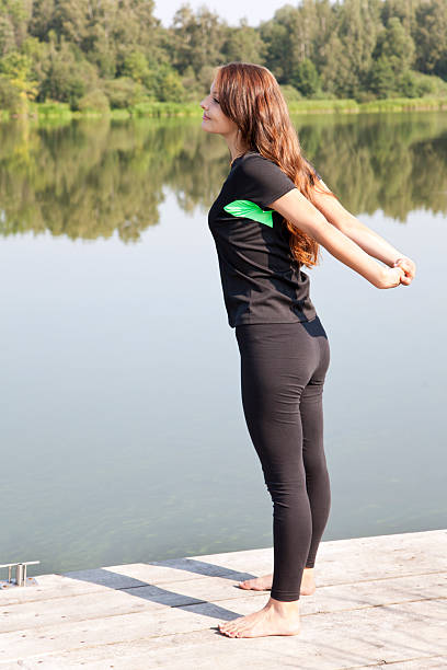 istock Yong woman performs stretching relaxation 599137768