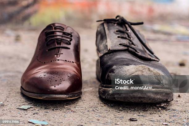 Concept Of Rich And Poor In Person Stock Photo - Download Image Now - Poverty, Wealth, Shoe