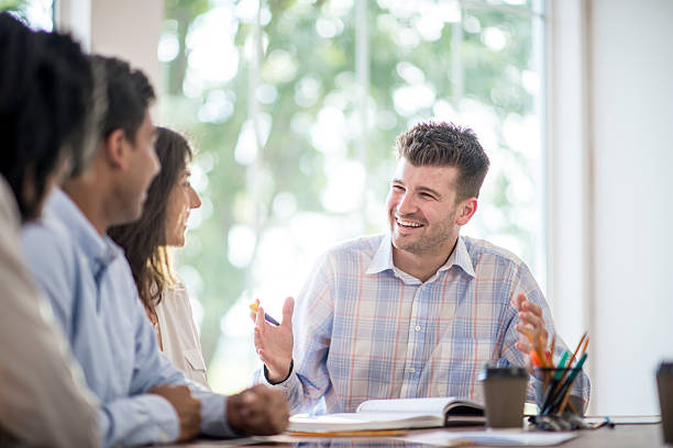 istock Discussing Business Ideas in a Team Meeting 599144572