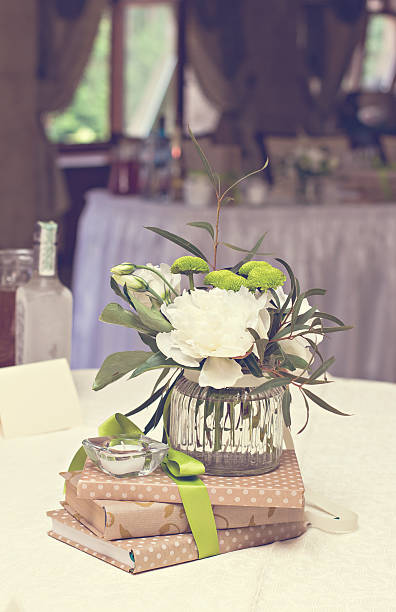 istock bouquet of white flowers. wedding table decor. 599146350