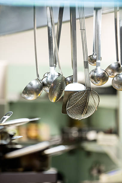 istock Close-up of hanging kitchen utensils 599146426
