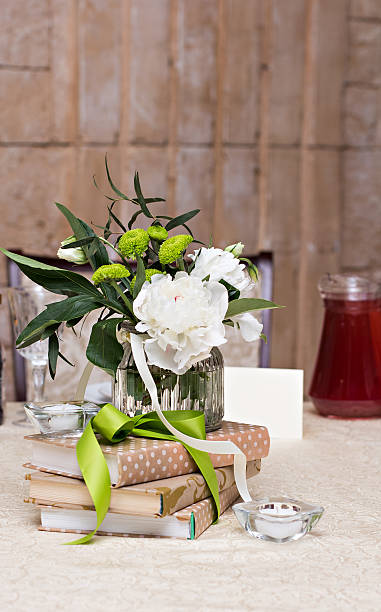 istock bouquet of white flowers. wedding table decor. 599224922