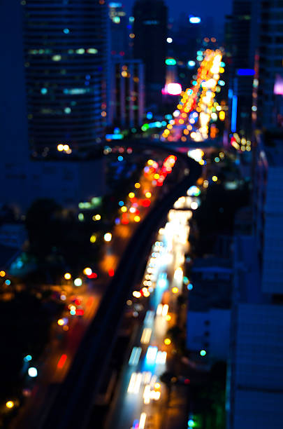 Background blur and bokeh in the streets and opened fire at the building in the city during the night.