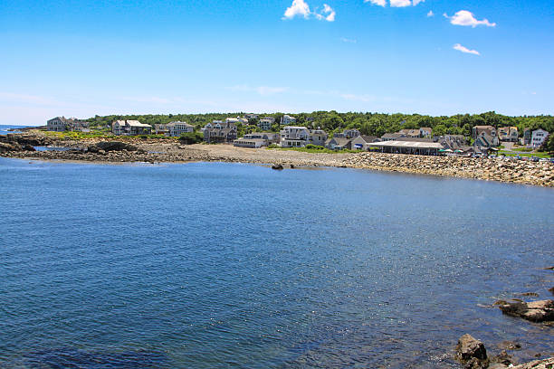 istock Harbor View, Rocks and Waterfront Houses, Perkins Cove, Ogunquit, Maine. 599241420