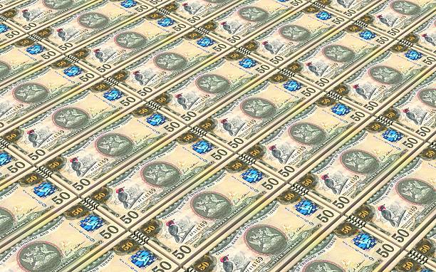 istock Trinidad and Tobago dollar bills stacks background. 599241924