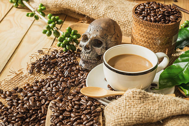 istock still life photography, coffee beans with skull 599242262