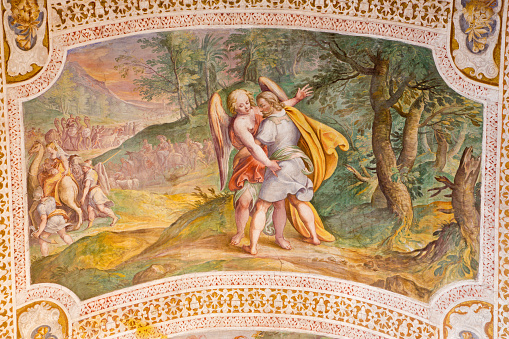 Rome, Italy - March 11, 2016: Rome - The Jacob Wrestles with an Angel by Antonio Viviani (1560–1620). Fresco from the vault of stairs in church Chiesa di San Lorenzo in Palatio ad Sancta Sanctorum.
