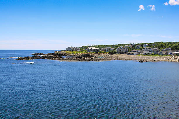 istock Harbor View, Rocks and Waterfront Houses, Perkins Cove, Ogunquit, Maine. 599244544