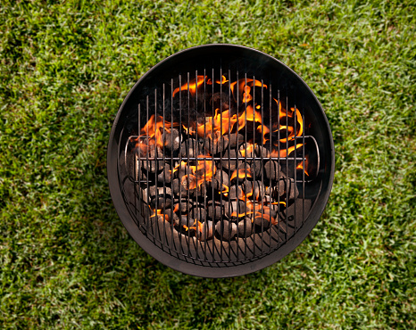 Charcoal BBQ in the Backyard on Grass-Photographed on a Hasselblad H3D11-39 megapixel Camera System