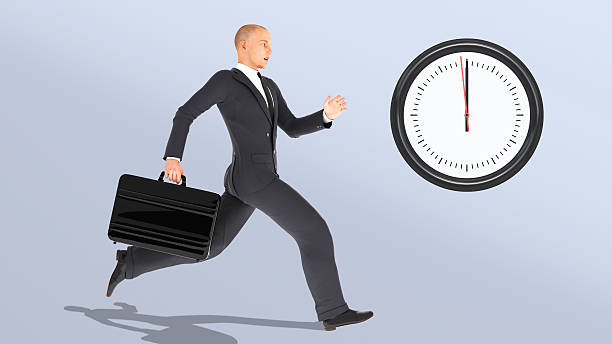istock Businessman with a briefcase running late, businessperson chasing clock 599257512