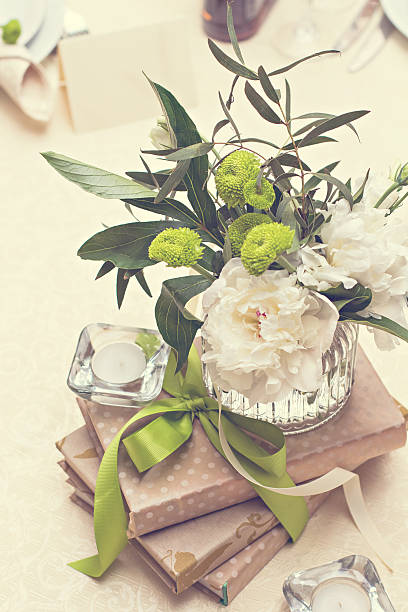 istock bouquet of white flowers. wedding table decor. 599259994
